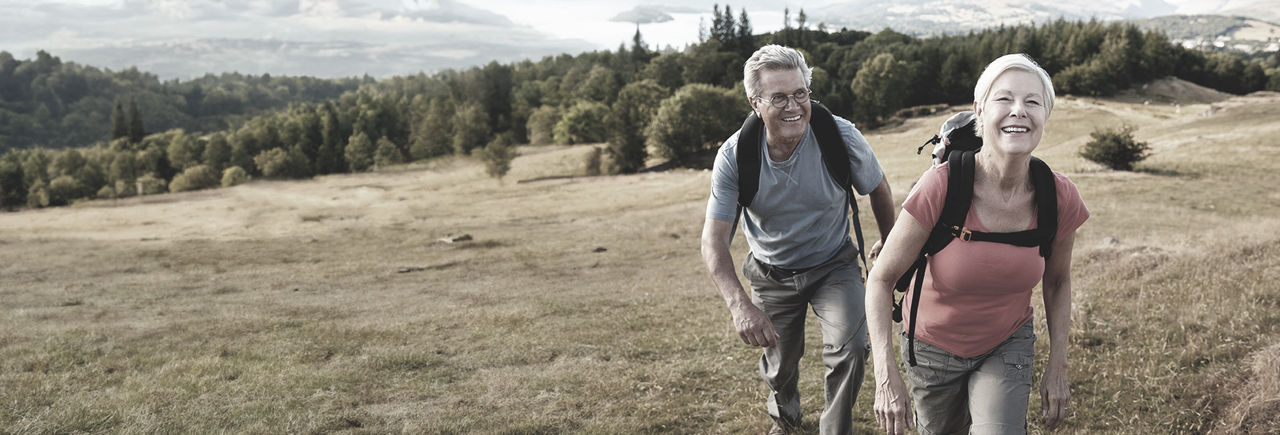  Senior couple hiking in nature